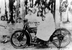 A woman poses on a Tampa Police Department motorcycle